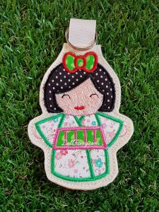 Green Kimono Kokeshi Japanese doll key fob.